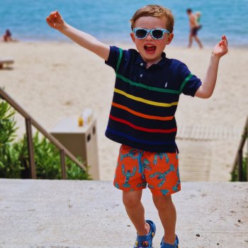 Child on beach jumping Child on beach jumping